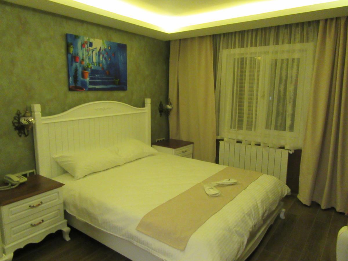 Trilye Kaplan Hotel 穆达尼亚 外观 照片